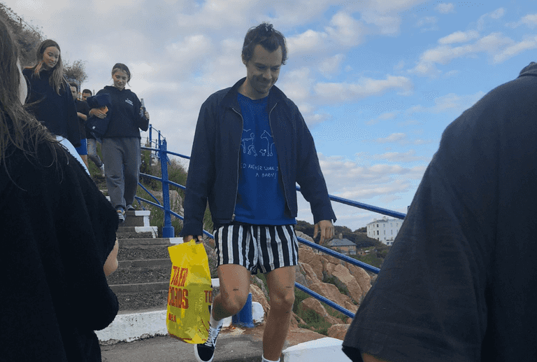 Harry Styles spotted at the Vico with a bag of cans