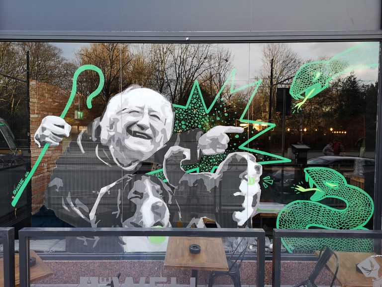 New St. Patrick’s Day mural shows President Higgins and his dogs chase out the snakes New St. Patrick’s Day mural shows President Higgins and his dogs chase out the snakes